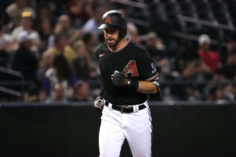 May 9, 2023; Phoenix, Arizona, USA; Arizona Diamondbacks third baseman Evan Longoria (3) runs the bases after hitting a solo home run against the Miami Marlins during the eighth inning at Chase Field. Mandatory Credit: Joe Camporeale-USA TODAY Sports