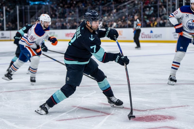 Oct 25, 2025; Seattle, Washington, USA; Seattle Kraken forward Jordan Eberle (7) shoots the puck during the second period at Climate Pledge Arena. Mandatory Credit: Stephen Brashear-Imagn Images