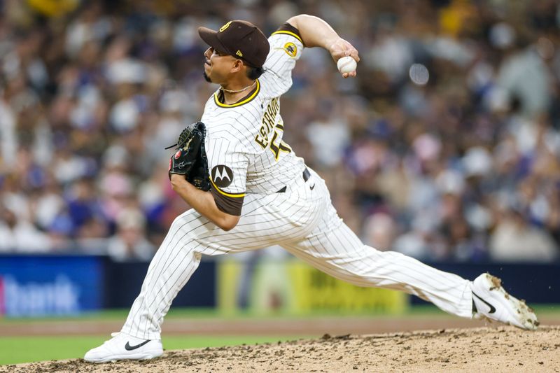 Jun 9, 2025; San Diego, California, USA; San Diego Padres relief pitcher Jeremiah Estrada (56) throws a pitch during the seventh inning against the Los Angeles Dodgers at Petco Park. Mandatory Credit: David Frerker-Imagn Images