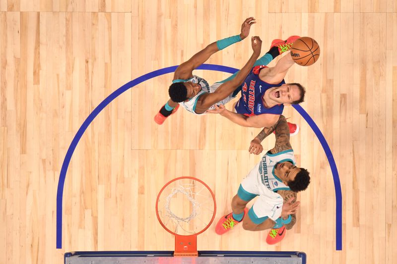 DETROIT, MI - JANUARY 24: Bojan Bogdanovic #44 of the Detroit Pistons drives to the basket during the game against the Charlotte Hornets on January 24, 2024 at Little Caesars Arena in Detroit, Michigan. NOTE TO USER: User expressly acknowledges and agrees that, by downloading and/or using this photograph, User is consenting to the terms and conditions of the Getty Images License Agreement. Mandatory Copyright Notice: Copyright 2024 NBAE (Photo by Chris Schwegler/NBAE via Getty Images)