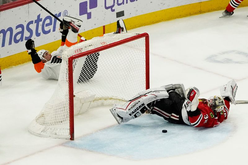 Apr 13, 2023; Chicago, Illinois, USA; Philadelphia Flyers defenseman Ivan Provorov (9) celebrates after scoring a goal on Chicago Blackhawks goaltender Alex Stalock (32) during overtime at United Center. Mandatory Credit: David Banks-USA TODAY Sports