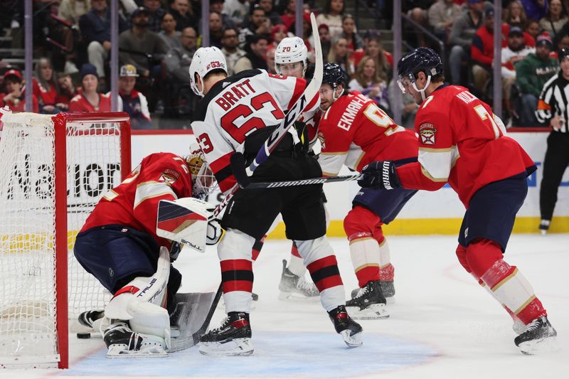 Jan 13, 2024; Sunrise, Florida, USA; New Jersey Devils left wing Jesper Bratt (63) scores against Florida Panthers goaltender Sergei Bobrovsky (72) during the first period at Amerant Bank Arena. Mandatory Credit: Sam Navarro-USA TODAY Sports