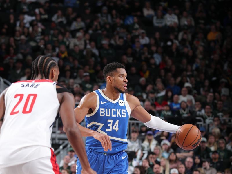 MILWAUKEE, WI - NOVEMBER 30: Giannis Antetokounmpo #34 of the Milwaukee Bucks handles the ball during the game against the Washington Wizards on November 30, 2024 at Fiserv Forum Center in Milwaukee, Wisconsin. NOTE TO USER: User expressly acknowledges and agrees that, by downloading and or using this Photograph, user is consenting to the terms and conditions of the Getty Images License Agreement. Mandatory Copyright Notice: Copyright 2024 NBAE (Photo by Gary Dineen/NBAE via Getty Images).