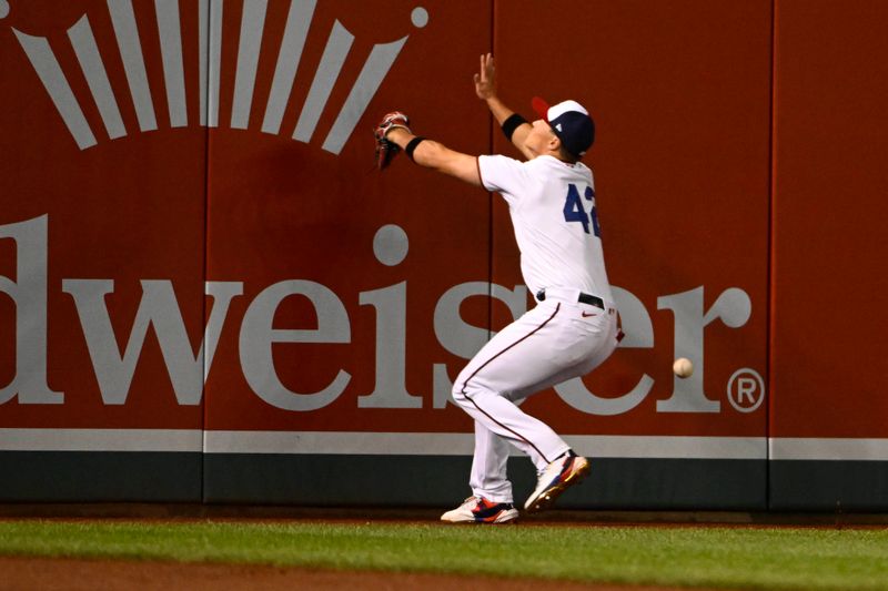 Apr 15, 2023; Washington, District of Columbia, USA; Washington Nationals right fielder Lane Thomas (28) is unable to catch the RBI double hit by Cleveland Guardians first baseman Josh Bell (not shown) during the ninth inning at Nationals Park. Mandatory Credit: Brad Mills-USA TODAY Sports