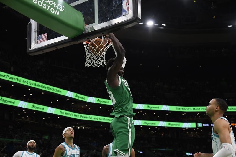 BOSTON, MA - APRIL 12:  Neemias Queta #88 of the Boston Celtics dunks the ball during the game against the Charlotte Hornets on April 12, 2024 at the TD Garden in Boston, Massachusetts. NOTE TO USER: User expressly acknowledges and agrees that, by downloading and or using this photograph, User is consenting to the terms and conditions of the Getty Images License Agreement. Mandatory Copyright Notice: Copyright 2024 NBAE  (Photo by Brian Babineau/NBAE via Getty Images)