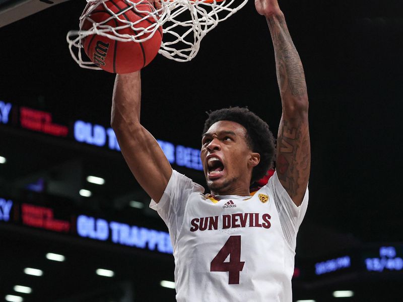 Nov 17, 2022; Brooklyn, New York, USA; Arizona State Sun Devils guard Desmond Cambridge Jr. (4) dunks the ball during the second half against the Michigan Wolverines at Barclays Center. Mandatory Credit: Vincent Carchietta-USA TODAY Sports