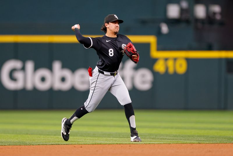 Jul 23, 2024; Arlington, Texas, USA; Chicago White Sox short stop Nicky Lopez (8) make a play on a ground ball during the sixth inning against the Texas Rangers at Globe Life Field. Mandatory Credit: Andrew Dieb-USA TODAY Sports