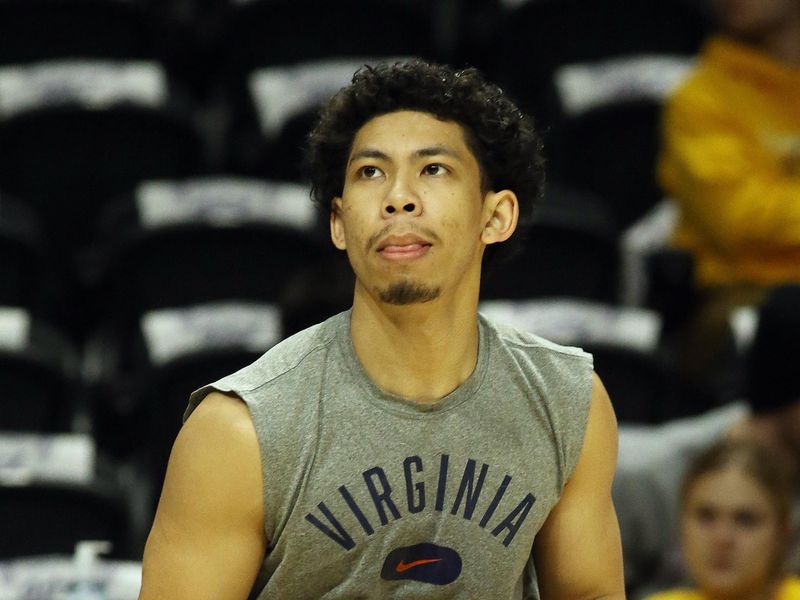 Jan 3, 2023; Pittsburgh, Pennsylvania, USA;  Virginia Cavaliers guard Kihei Clark (0) warms up before the game against the Pittsburgh Panthers at the Petersen Events Center. Mandatory Credit: Charles LeClaire-USA TODAY Sports