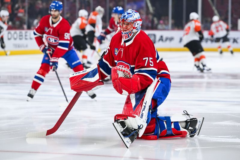 Nov 4, 2025; Montreal, Quebec, CAN; Montreal Canadiens goalie Jakub Dobes (75) stretches during warm-up before the game against the Philadelphia Flyers at Bell Centre. Mandatory Credit: David Kirouac-Imagn Images