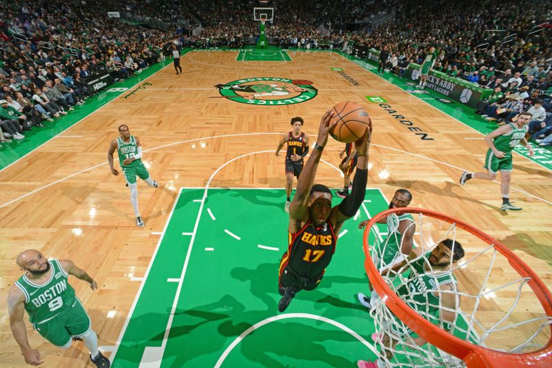 BOSTON, MA - FEBRUARY 7: Onyeka Okongwu #17 of the Atlanta Hawks drives to the basket during the game against the Boston Celtics on February 7, 2024 at the TD Garden in Boston, Massachusetts. NOTE TO USER: User expressly acknowledges and agrees that, by downloading and or using this photograph, User is consenting to the terms and conditions of the Getty Images License Agreement. Mandatory Copyright Notice: Copyright 2024 NBAE  (Photo by Brian Babineau/NBAE via Getty Images)