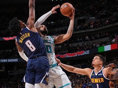 DENVER, CO - JANUARY 1: Miles Bridges #0 of the Charlotte Hornets drives to the basket during the game against the Denver Nuggets on January 1, 2024 at the Ball Arena in Denver, Colorado. NOTE TO USER: User expressly acknowledges and agrees that, by downloading and/or using this Photograph, user is consenting to the terms and conditions of the Getty Images License Agreement. Mandatory Copyright Notice: Copyright 2024 NBAE (Photo by Bart Young/NBAE via Getty Images)