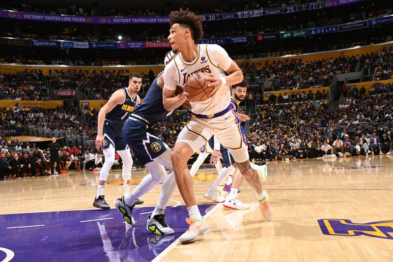 LOS ANGELES, CA - APRIL 27: Jaxson Hayes #11 of the Los Angeles Lakers drives to the basket during the game against the Denver Nuggets during Round 1 Game 4 of the 2024 NBA Playoffs on April 27, 2024 at Crypto.Com Arena in Los Angeles, California. NOTE TO USER: User expressly acknowledges and agrees that, by downloading and/or using this Photograph, user is consenting to the terms and conditions of the Getty Images License Agreement. Mandatory Copyright Notice: Copyright 2024 NBAE (Photo by Andrew D. Bernstein/NBAE via Getty Images)