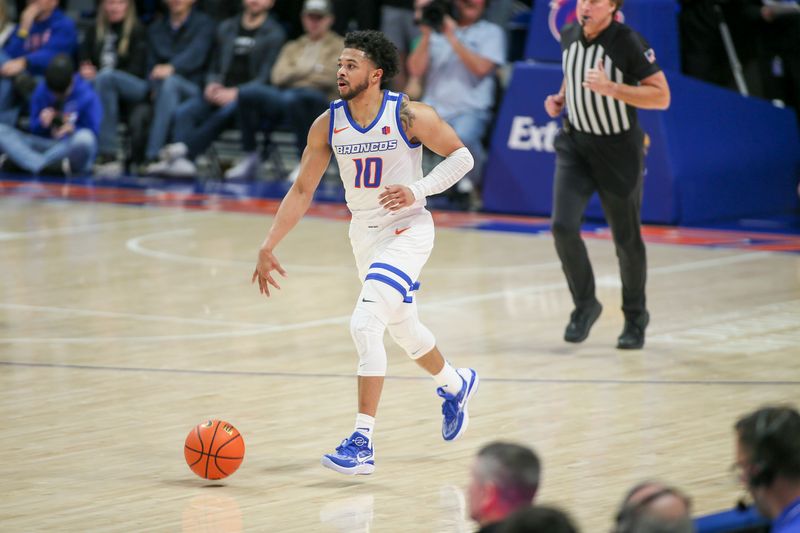 Feb 11, 2023; Boise, Idaho, USA; Boise State Broncos guard Marcus Shaver Jr. (10) dribbles during the second half against the Wyoming Cowboys at ExtraMile Arena. Boise State beats Wyoming 75-63. Mandatory Credit: Brian Losness-USA TODAY Sports
