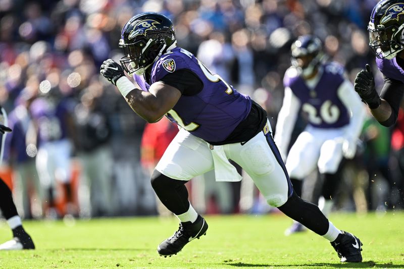 Baltimore Ravens defensive tackle Justin Madubuike in action during the first half of an NFL football game against the Detroit Lions, Sunday, Oct. 22, 2023, in Baltimore. (AP Photo/Terrance Williams)