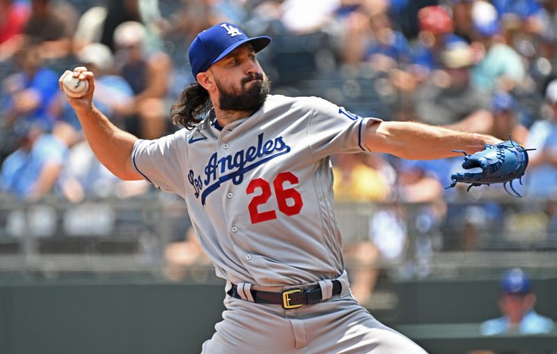 Jul 2, 2023; Kansas City, Missouri, USA;  Los Angeles Dodgers starting pitcher Tony Gonsolin (26) delivers a pitch in the first inning against the Kansas City Royals at Kauffman Stadium. Mandatory Credit: Peter Aiken-USA TODAY Sports