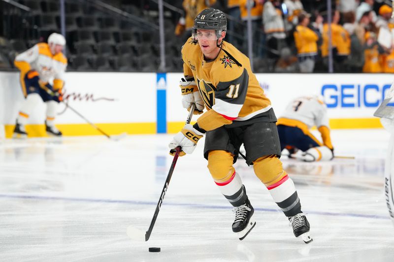 Feb 20, 2024; Las Vegas, Nevada, USA; Vegas Golden Knights left wing Mason Morelli (11) warms up before a game against the Nashville Predators at T-Mobile Arena. Mandatory Credit: Stephen R. Sylvanie-USA TODAY Sports
