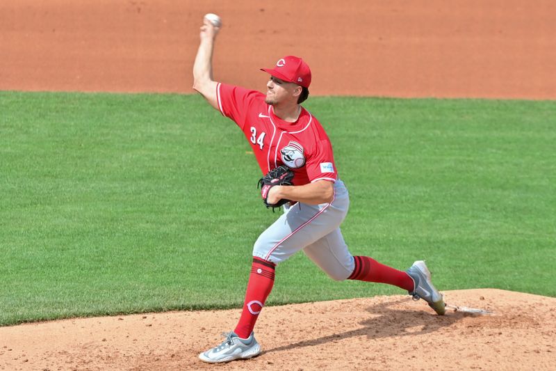 Feb 27, 2024; Mesa, Arizona, USA;  Cincinnati Reds starting pitcher Connor Phillips (34) throws in the fourth inning against the Chicago Cubs during a spring training game at Sloan Park. Mandatory Credit: Matt Kartozian-USA TODAY Sports