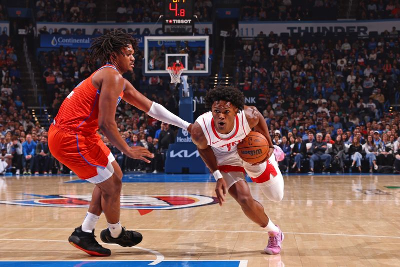 OKLAHOMA CITY, OK - NOVEMBER 8: Amen Thompson #1 of the Houston Rockets drives to the basket during the game against the Oklahoma City Thunder on November 8, 2024 at Paycom Center in Oklahoma City, Oklahoma. NOTE TO USER: User expressly acknowledges and agrees that, by downloading and or using this photograph, User is consenting to the terms and conditions of the Getty Images License Agreement. Mandatory Copyright Notice: Copyright 2024 NBAE (Photo by Zach Beeker/NBAE via Getty Images)