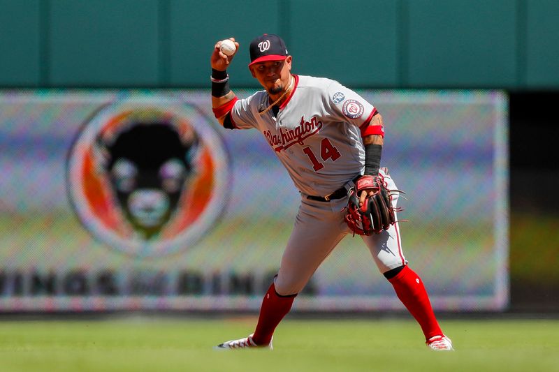 Aug 6, 2023; Cincinnati, Ohio, USA; Washington Nationals third baseman Ildemaro Vargas (14) throws to first to get Cincinnati Reds third baseman Nick Senzel (not pictured) out in the fourth inning at Great American Ball Park. Mandatory Credit: Katie Stratman-USA TODAY Sports