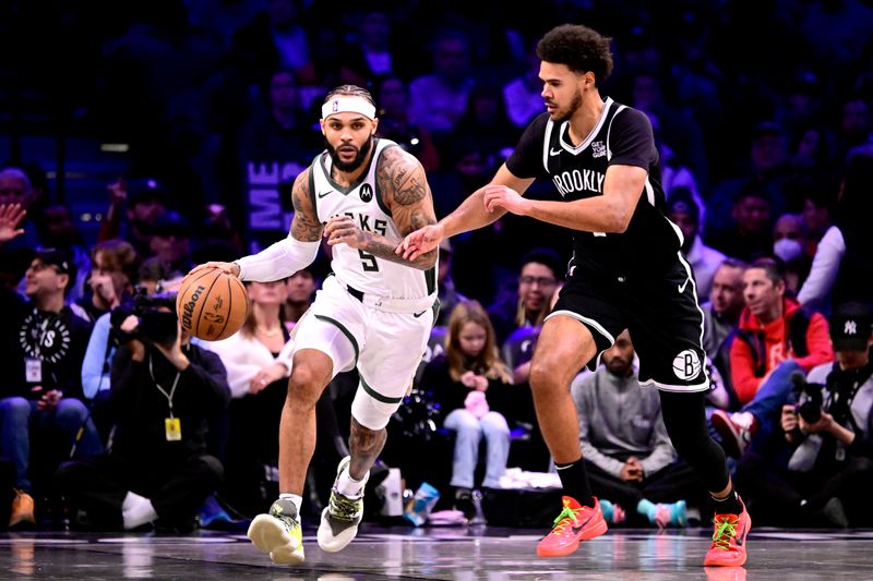 NEW YORK, NEW YORK - DECEMBER 08:  Gary Trent Jr. #5 of the Milwaukee Bucks is defended by Cameron Johnson #2 of the Brooklyn Nets during the first half at Barclays Center on December 08, 2024 in New York City. NOTE TO USER: User expressly acknowledges and agrees that, by downloading and or using this Photograph, user is consenting to the terms and conditions of the Getty Images License Agreement.  (Photo by Steven Ryan/Getty Images)