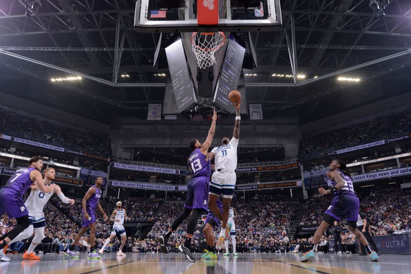 SACRAMENTO, CA - NOVEMBER 15: Naz Reid #11 of the Minnesota Timberwolves drives to the basket during the game against the Sacramento Kings during the Emirates NBA Cup game on November 15, 2024 at Golden 1 Center in Sacramento, California. NOTE TO USER: User expressly acknowledges and agrees that, by downloading and or using this Photograph, user is consenting to the terms and conditions of the Getty Images License Agreement. Mandatory Copyright Notice: Copyright 2024 NBAE (Photo by Rocky Widner/NBAE via Getty Images)