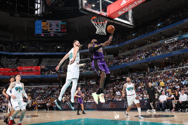 MEMPHIS, TN - NOVEMBER 6: LeBron James #23 of the Los Angeles Lakers drives to the basket during the game against the Memphis Grizzlies on November 6, 2024 at FedExForum in Memphis, Tennessee. NOTE TO USER: User expressly acknowledges and agrees that, by downloading and or using this photograph, User is consenting to the terms and conditions of the Getty Images License Agreement. Mandatory Copyright Notice: Copyright 2024 NBAE (Photo by Joe Murphy/NBAE via Getty Images)