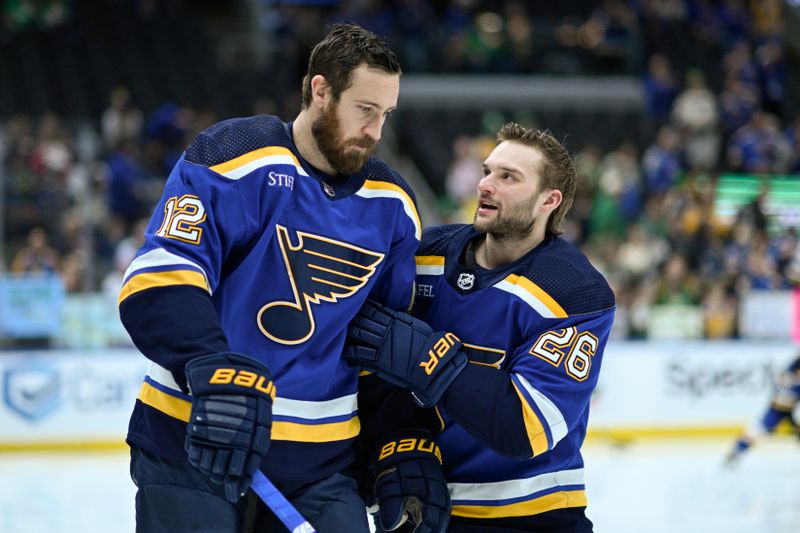 Mar 17, 2024; St. Louis, Missouri, USA; St. Louis Blues left wing Nathan Walker (26) talks to right wing Kevin Hayes (12) before a game against the Anaheim Ducks at Enterprise Center. Mandatory Credit: Jeff Le-USA TODAY Sports