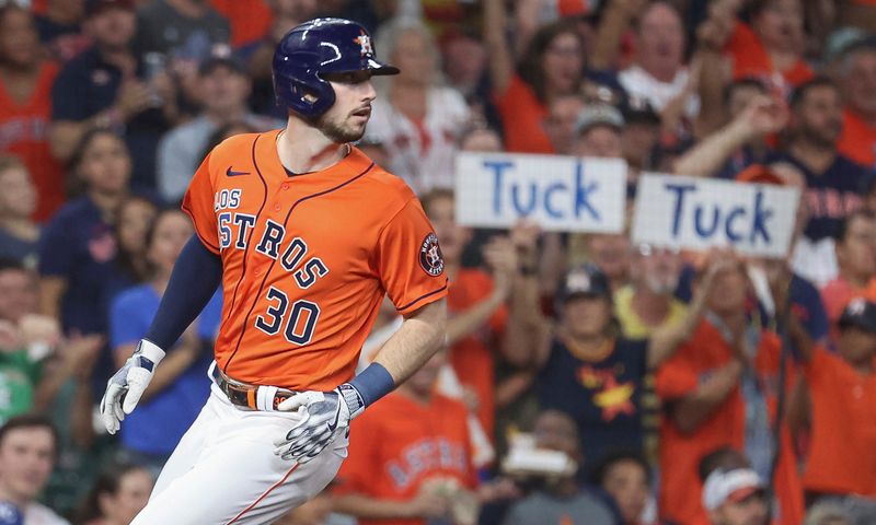 Sep 22, 2023; Houston, Texas, USA; Houston Astros right fielder Kyle Tucker (30) pulls into third base with a triple during the fourth inning against the Kansas City Royals at Minute Maid Park. Mandatory Credit: Troy Taormina-USA TODAY Sports