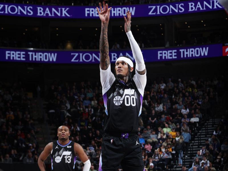 SALT LAKE CITY, UT - MARCH 14: Jordan Clarkson #00 of the Utah Jazz shoots a free throw during the game against the Toronto Raptors on March 14, 2025 at Delta Center in Salt Lake City, Utah. NOTE TO USER: User expressly acknowledges and agrees that, by downloading and or using this Photograph, User is consenting to the terms and conditions of the Getty Images License Agreement. Mandatory Copyright Notice: Copyright 2025 NBAE (Photo by Melissa Majchrzak/NBAE via Getty Images)