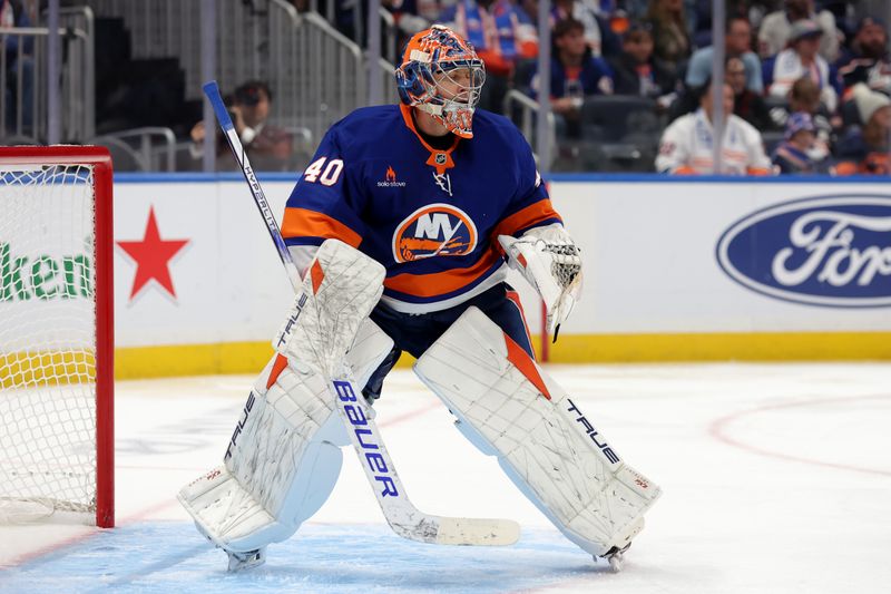 Oct 10, 2024; Elmont, New York, USA; New York Islanders goaltender Semyon Varlamov (40) tends net against the Utah Hockey Club during the third period at UBS Arena. Mandatory Credit: Brad Penner-Imagn Images