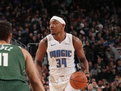 MILWAUKEE, WI - DECEMBER 21:  Wendell Carter Jr. #34 of the Orlando Magic handles the ball during the game against the Milwaukee Bucks on December 21, 2023 at the Fiserv Forum Center in Milwaukee, Wisconsin. NOTE TO USER: User expressly acknowledges and agrees that, by downloading and or using this Photograph, user is consenting to the terms and conditions of the Getty Images License Agreement. Mandatory Copyright Notice: Copyright 2023 NBAE (Photo by Gary Dineen/NBAE via Getty Images).