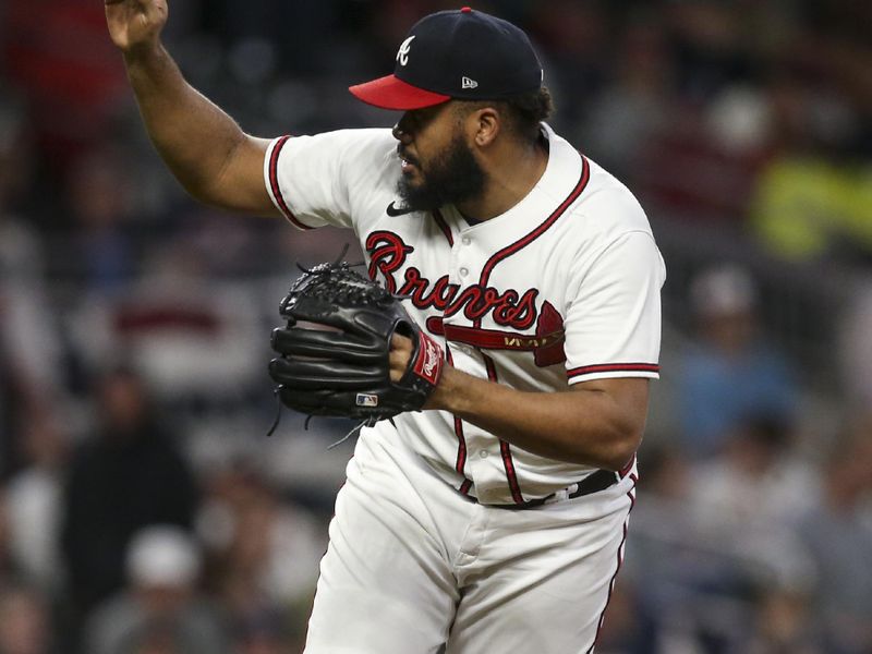 Oct 12, 2022; Atlanta, Georgia, USA; Atlanta Braves relief pitcher Kenley Jansen (74) throws against the Philadelphia Phillies in the ninth inning during game two of the NLDS for the 2022 MLB Playoffs at Truist Park. Mandatory Credit: Brett Davis-USA TODAY Sports