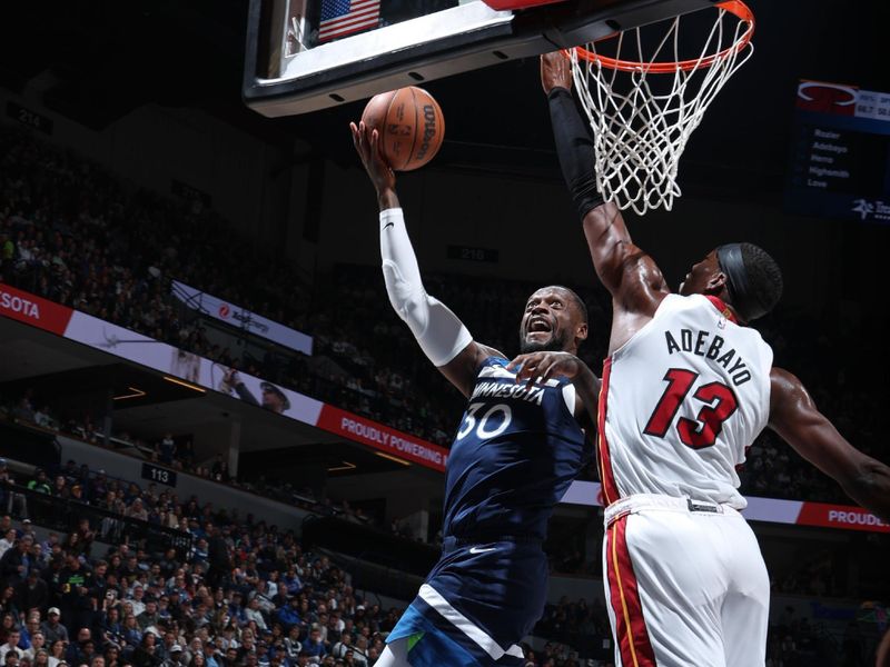 MINNEAPOLIS, MN -  NOVEMBER 10: Julius Randle #30 of the Minnesota Timberwolves shoots the ball during the game against the Miami Heat on November 10, 2024 at Target Center in Minneapolis, Minnesota. NOTE TO USER: User expressly acknowledges and agrees that, by downloading and or using this Photograph, user is consenting to the terms and conditions of the Getty Images License Agreement. Mandatory Copyright Notice: Copyright 2024 NBAE (Photo by David Sherman/NBAE via Getty Images)