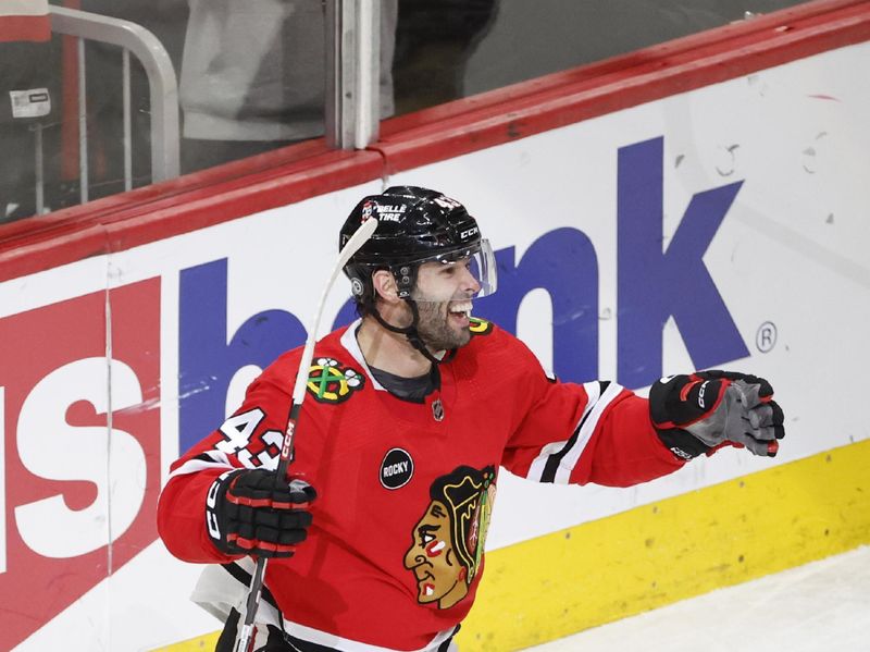 Mar 10, 2024; Chicago, Illinois, USA; Chicago Blackhawks center Colin Blackwell (43) celebrates after scoring his third goal of the game against the Arizona Coyotes during the third period at United Center. Mandatory Credit: Kamil Krzaczynski-USA TODAY Sports