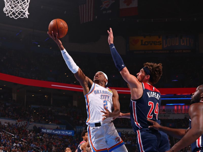 OKLAHOMA CITY, OK - FEBRUARY 23: Shai Gilgeous-Alexander #2 of the Oklahoma City Thunder drives to the basket during the game against the Washington Wizards on February 23, 2024 at Paycom Arena in Oklahoma City, Oklahoma. NOTE TO USER: User expressly acknowledges and agrees that, by downloading and or using this photograph, User is consenting to the terms and conditions of the Getty Images License Agreement. Mandatory Copyright Notice: Copyright 2024 NBAE (Photo by Zach Beeker/NBAE via Getty Images)