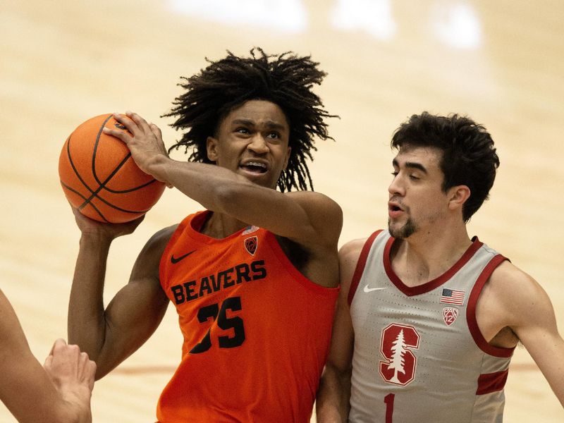 Jan 19, 2023; Stanford, California, USA; Oregon State Beavers forward Glenn Taylor Jr. (35) is fouled by Stanford Cardinal guard Isa Silva (1) as he goes up for a shot during the second half at Maples Pavilion. Stanford defeated Oregon State 67-46. Mandatory Credit: D. Ross Cameron-USA TODAY Sports