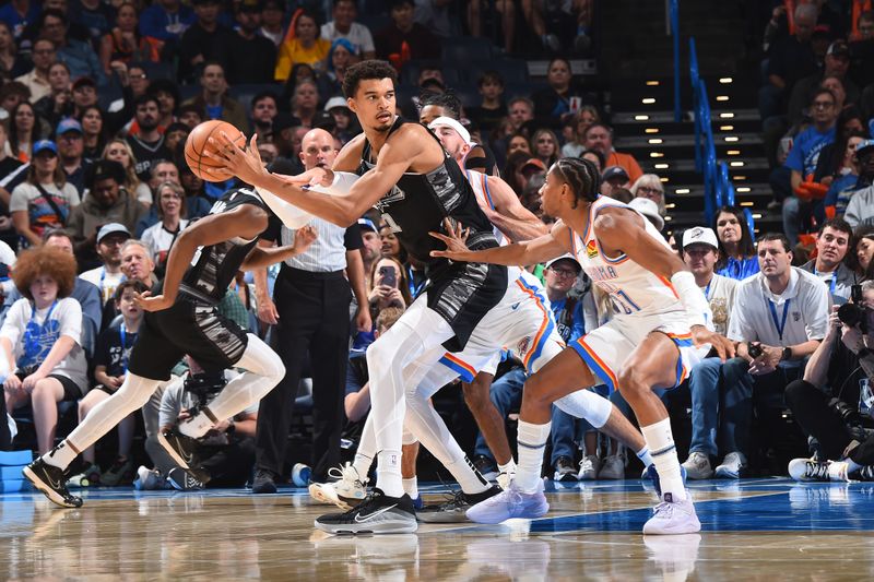 OKLAHOMA CITY, OK - OCTOBER 30: Victor Wembanyama #1 of the San Antonio Spurs handles the ball during the game against the Oklahoma City Thunder on October 30, 2024 at Paycom Center in Oklahoma City, Oklahoma. NOTE TO USER: User expressly acknowledges and agrees that, by downloading and or using this photograph, User is consenting to the terms and conditions of the Getty Images License Agreement. Mandatory Copyright Notice: Copyright 2024 NBAE (Photo by Brian Babineau/NBAE via Getty Images)