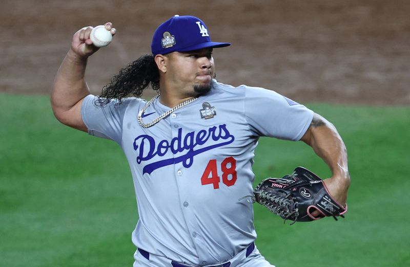 Oct 30, 2024; New York, New York, USA; Los Angeles Dodgers pitcher Brusdar Graterol (48) throws during the sixth inning against the New York Yankees in game five of the 2024 MLB World Series at Yankee Stadium. Mandatory Credit: Wendell Cruz-Imagn Images