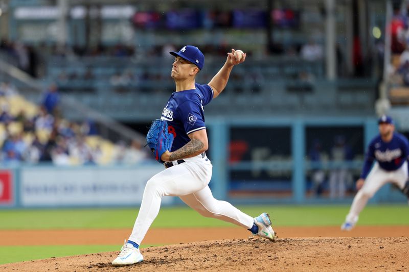 Mar 24, 2024; Los Angeles, California, USA;  Los Angeles Dodgers starting pitcher Bobby Miller (28) pitches during the third inning against the Los Angeles Angels at Dodger Stadium. Mandatory Credit: Kiyoshi Mio-USA TODAY Sports