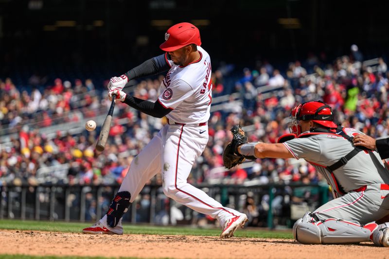 Apr 7, 2024; Washington, District of Columbia, USA; Washington Nationals second base Luis García Jr. (2) hits a single during the second inning against the Philadelphia Phillies at Nationals Park. Mandatory Credit: Reggie Hildred-USA TODAY Sports