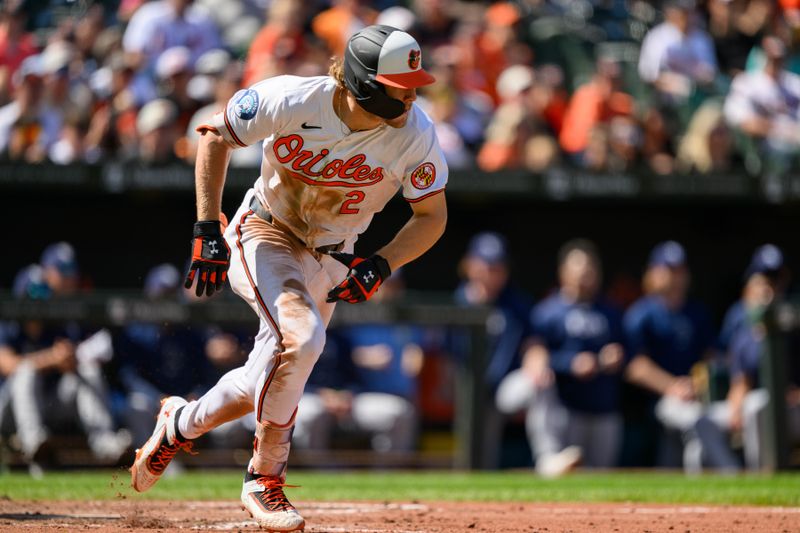 Sep 8, 2024; Baltimore, Maryland, USA; Baltimore Orioles shortstop Gunnar Henderson (2) hits a single during the seventh inning against the Tampa Bay Rays at Oriole Park at Camden Yards. Mandatory Credit: Reggie Hildred-Imagn Images