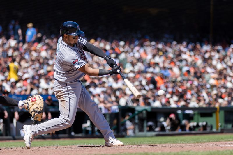 Apr 21, 2024; San Francisco, California, USA;  Arizona Diamondbacks catcher Gabriel Moreno (14) hits a two-run single against the San Francisco Giants during the sixth inning at Oracle Park. Mandatory Credit: John Hefti-USA TODAY Sports