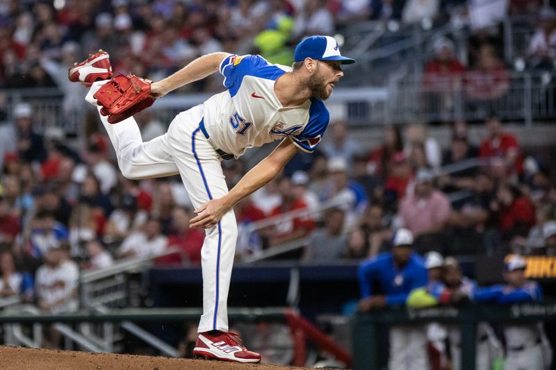 Sep 14, 2024; Cumberland, Georgia, USA; Atlanta Braves pitcher Chris Sale (51) pitches the ball against the Los Angeles Dodgers during the first inning at Truist Park. Mandatory Credit: Jordan Godfree-Imagn Images