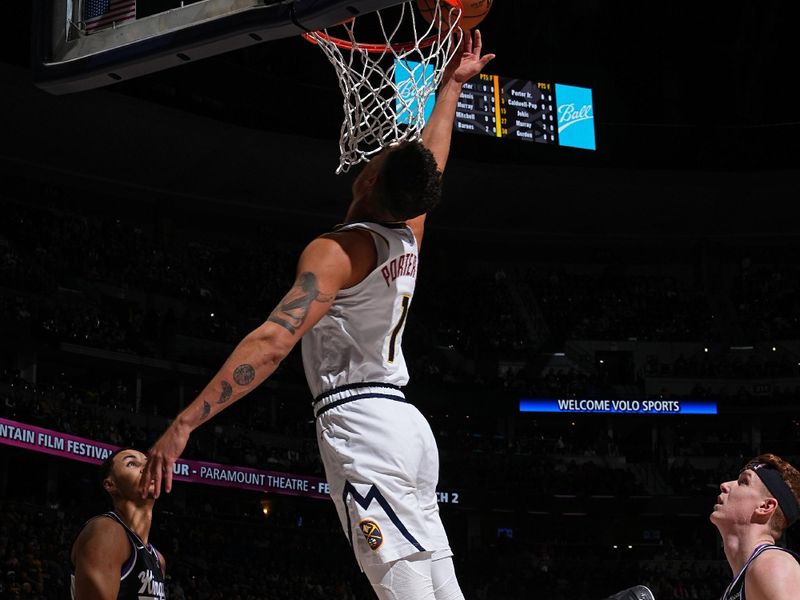 DENVER, CO - FEBRUARY 28: Michael Porter Jr. #1 of the Denver Nuggets drives to the basket during the game against the Sacramento Kings on February 28, 2024 at the Ball Arena in Denver, Colorado. NOTE TO USER: User expressly acknowledges and agrees that, by downloading and/or using this Photograph, user is consenting to the terms and conditions of the Getty Images License Agreement. Mandatory Copyright Notice: Copyright 2024 NBAE (Photo by Garrett Ellwood/NBAE via Getty Images)