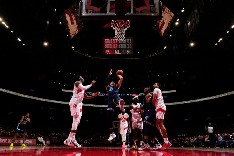 TORONTO, CANADA - JANUARY 22: Luke Kennard #10 of the Memphis Grizzlies shoots the ball during the game against the Toronto Raptors on January 22, 2024 at the Scotiabank Arena in Toronto, Ontario, Canada.  NOTE TO USER: User expressly acknowledges and agrees that, by downloading and or using this Photograph, user is consenting to the terms and conditions of the Getty Images License Agreement.  Mandatory Copyright Notice: Copyright 2024 NBAE (Photo by Mark Blinch/NBAE via Getty Images)