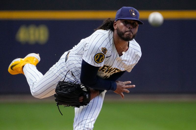 May 4, 2025; Milwaukee, Wisconsin, USA; Milwaukee Brewers pitcher Freddy Peralta (51) delivers a pitch against the Chicago Cubs in the first inning at American Family Field. Mandatory Credit: Michael McLoone-Imagn Images