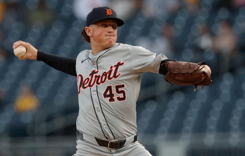 Apr 8, 2024; Pittsburgh, Pennsylvania, USA;  Detroit Tigers  starting pitcher Reese Olson (45) delivers a pitch against the Pittsburgh Pirates during the first inning at PNC Park. Mandatory Credit: Charles LeClaire-USA TODAY Sports