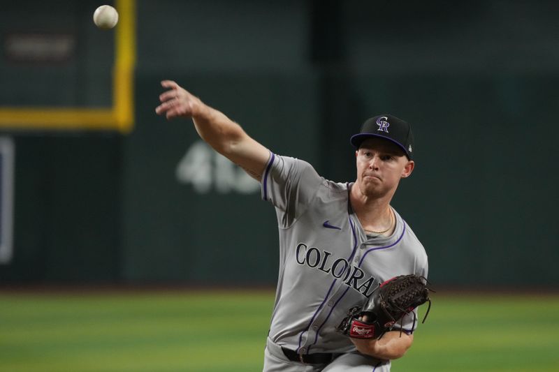 Aug 14, 2024; Phoenix, Arizona, USA; Colorado Rockies pitcher Tanner Gordon (29) throws against the Arizona Diamondbacks in the first inning at Chase Field. Mandatory Credit: Rick Scuteri-USA TODAY Sports