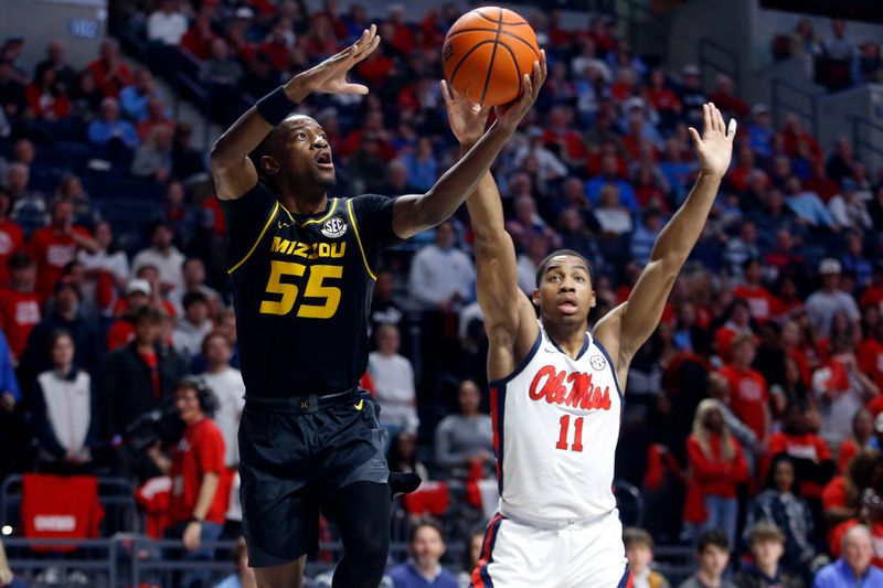 Feb 17, 2024; Oxford, Mississippi, USA; Missouri Tigers guard Sean East II (55) shoots during the first half against the Mississippi Rebels at The Sandy and John Black Pavilion at Ole Miss. Mandatory Credit: Petre Thomas-USA TODAY Sports