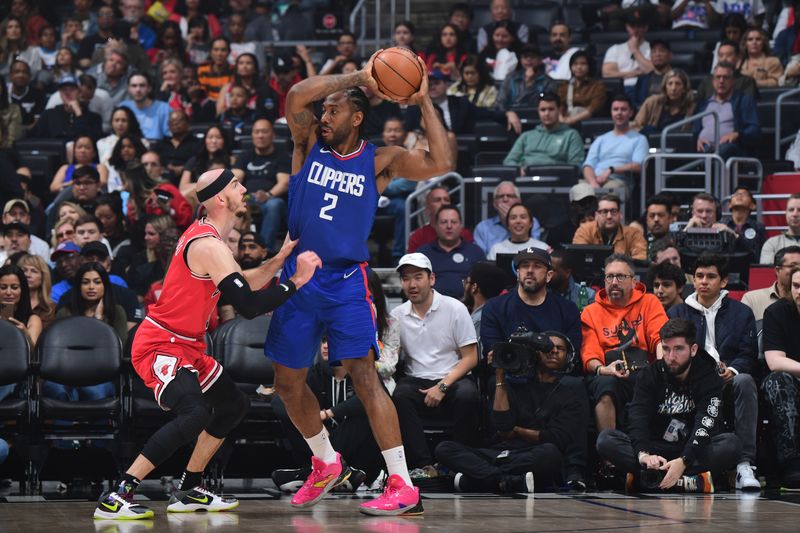 LOS ANGELES, CA - MARCH 9: Kawhi Leonard #2 of the LA Clippers handles the ball during the game against the Chicago Bulls on March 9, 2024 at Crypto.Com Arena in Los Angeles, California. NOTE TO USER: User expressly acknowledges and agrees that, by downloading and/or using this Photograph, user is consenting to the terms and conditions of the Getty Images License Agreement. Mandatory Copyright Notice: Copyright 2024 NBAE (Photo by Adam Pantozzi/NBAE via Getty Images)